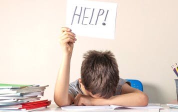 child struggling with maths or reading