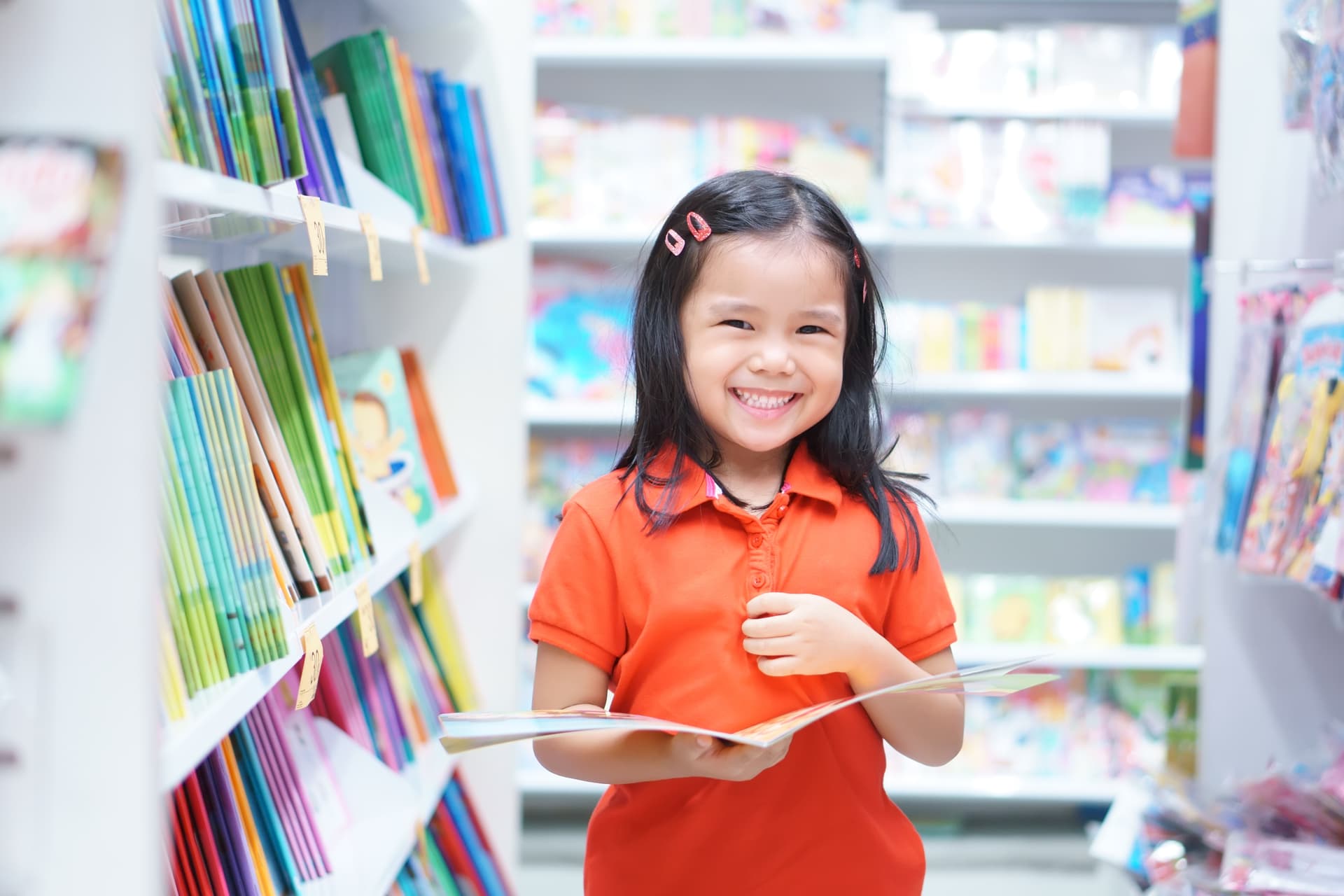 Student reading in library