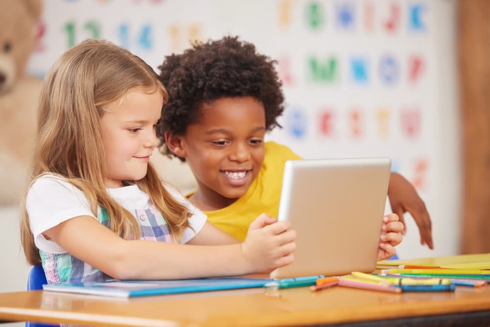 Engaged students on tablet